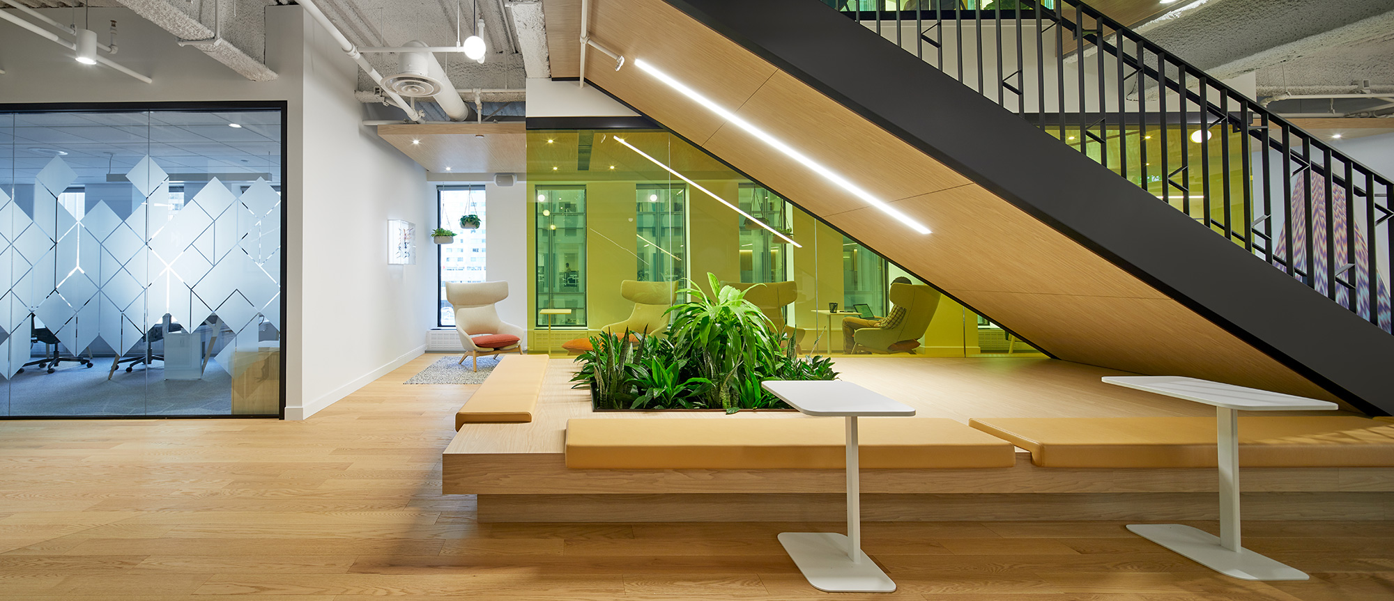 Commercial Interior Projects - Staircase and plants at Fiera headquarters in Laval designed by VAD Interior Designers